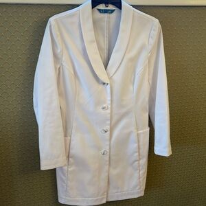 Woman’s size 2 Merit P. White lab coat.